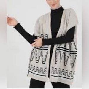 Wharehose ivory and black sleeveless cardigan S/M women’s wool blend stunning